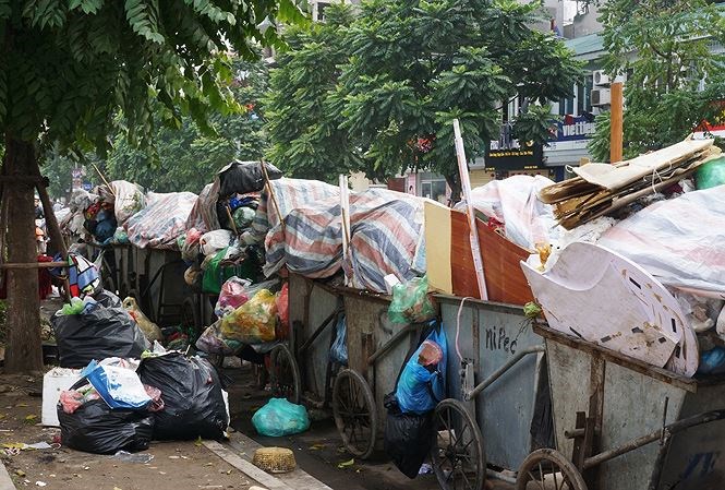 Hà Nội: Khẩn trương giải quyết vướng mắc tại bãi rác Nam Sơn - ảnh 1