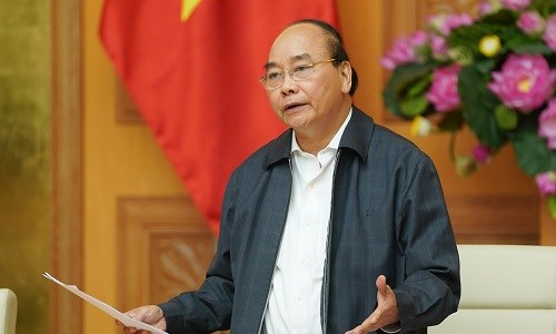Thủ tướng: Kiên quyết cách ly người từ vùng dịch vào Việt Nam - Anh 1