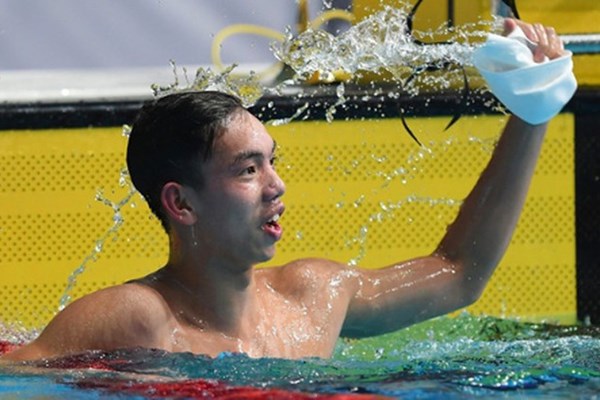 Kình ngư Nguyễn Huy Hoàng giành chuẩn A Olympic cho bơi Việt Nam - Anh 1