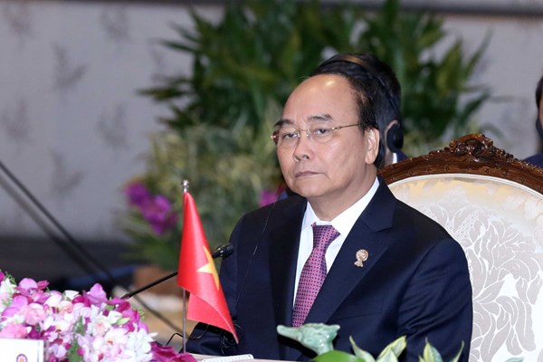 Thủ tướng: Việt Nam quyết tâm, kiên trì bảo vệ luật pháp quốc tế trong vấn đề Biển Đông - Anh 1