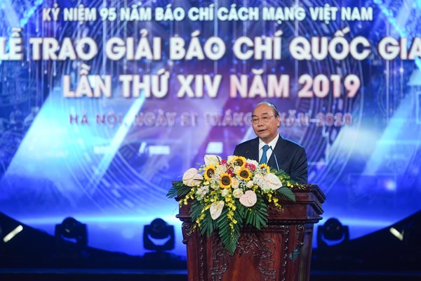 Thủ tướng: Báo chí góp phần nâng cao dân trí, giữ gìn bản sắc, phát triển văn hóa và con người Việt Nam - Anh 1