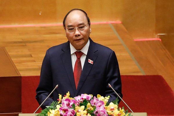 Chủ tịch nước Nguyễn Xuân Phúc: “Khó khăn không làm chùn bước chân của chúng ta” - Anh 1