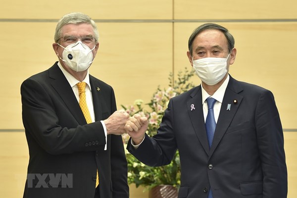 Chủ tịch Ủy ban Olympic Quốc tế ủng hộ Nhật Bản ban bố tình trạng khẩn cấp tại Tokyo - Anh 1