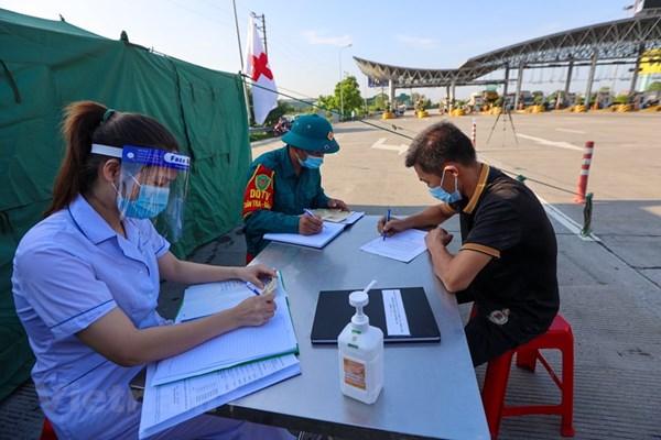 Hà Nội: Kêu gọi người dân thực hiện khai báo y tế thường xuyên - Anh 1