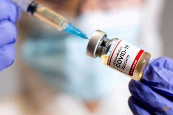 Mỹ lên kế hoạch yêu cầu du khách nước ngoài phải tiêm đầy đủ vaccine Covid-19 mới được nhập cảnh - Anh 1