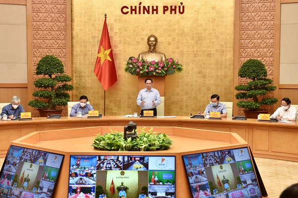 Thủ tướng Phạm Minh Chính: Đã hy sinh để giãn cách xã hội thì phải sớm đạt mục tiêu kiềm chế dịch bệnh - Anh 1