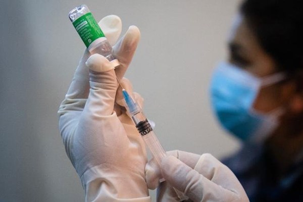 Tổ chức Y tế Thế giới dự báo lượng vắcxin ngừa Covid-19 sẽ ít hơn so với kỳ vọng - Anh 1