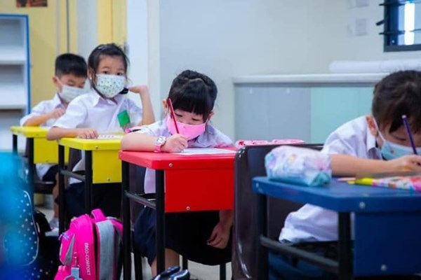 Singapore: Học sinh phải làm test nhanh Covid-19 hai tuần một lần - Anh 1