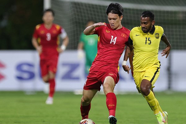 Hai cầu thủ của tuyển Việt Nam dương tính với Covid-19 - Anh 1