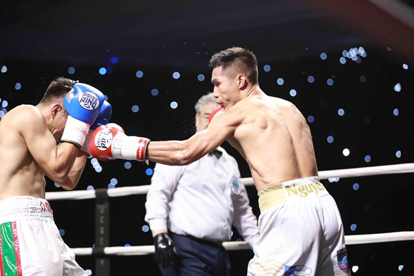 Võ sĩ Việt Nam thắng điểm nhà vô địch Trung Quốc tại giải boxing quốc tế - Anh 2