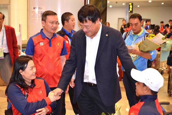 Đoàn Thể thao Người khuyết tật Việt Nam về nước sau Asian Para Games 4 - Anh 1