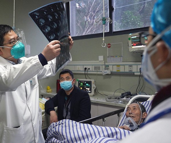 Đã có 54 người tử vong vì dịch viêm phổi lạ, y tế Vũ Hán bị quá tải - Anh 1
