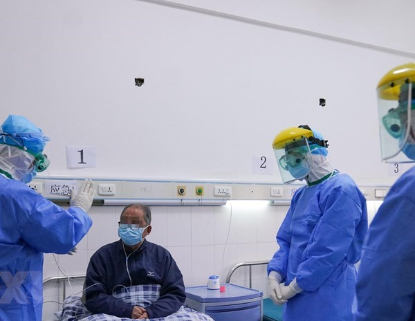 Số bệnh nhân bị sốt do virus corona tại Trung Quốc đang giảm dần - Anh 1