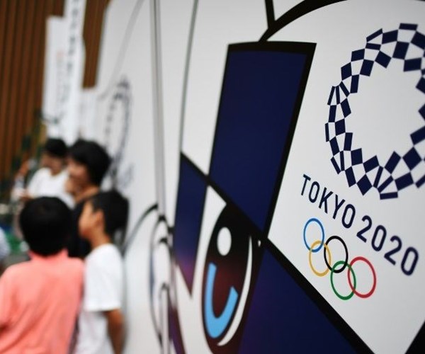 Nhật Bản khẳng định Covid -19 không ảnh hưởng tới Olympic 2020 - Anh 1