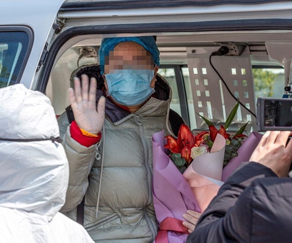 Trung Quốc ghi nhận 409 ca nhiễm Covid-19 mới, 150 ca tử vong - Anh 1