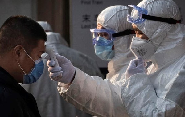 WHO: Số ca nhiễm Covid - 19 ngoài Trung Quốc lên tới hơn 7.000 người - Anh 1