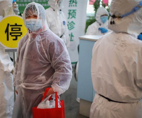 Trung Quốc tiếp tục ghi nhận số ca nhiễm mới Covid-19 giảm - Anh 1