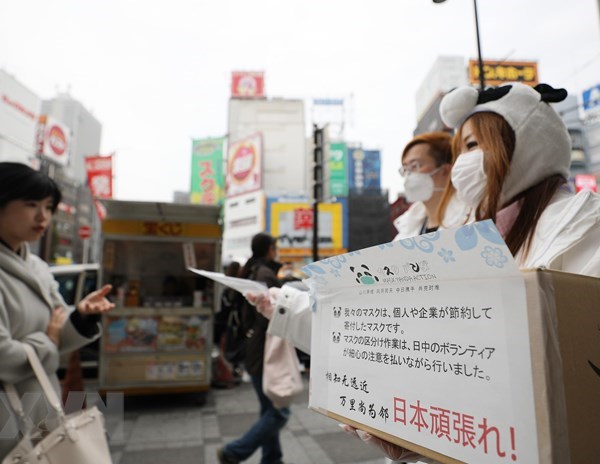 Nhật Bản ghi nhận ngày có số ca nhiễm Covid -19 mới tăng nhiều nhất - Anh 1