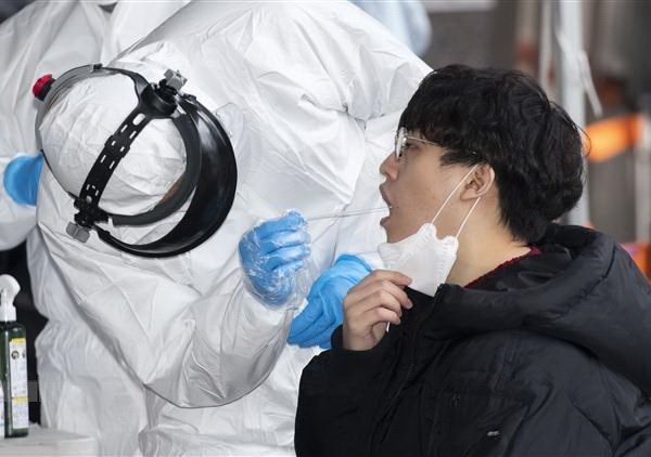 Hàn Quốc có thêm 14 ca nhiễm mới và 6 ca tử vong do Covid-19 - Anh 1