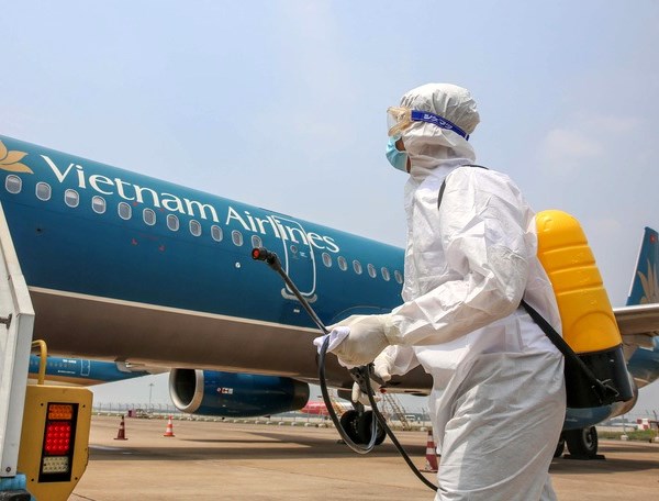 Vietnam Airlines tiếp tục vận chuyển hành khách từ châu Âu về Việt Nam với điều kiện nghiêm ngặt - Anh 1