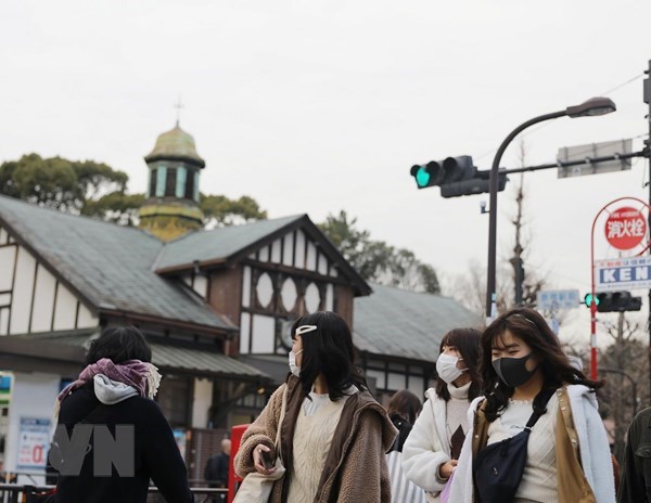 Nhật Bản: Số ca nhiễm Covid-19 tăng lên gần 1.500 ca - Anh 1