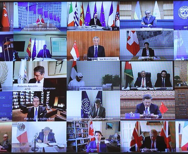 Họp trực tuyến G20, Thủ tướng chia sẻ nhiều biện pháp hành động chung ứng phó Covid-19 - Anh 1