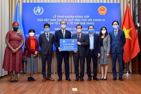 Việt Nam ủng hộ Quỹ ứng phó với Covid-19 của WHO - Anh 1
