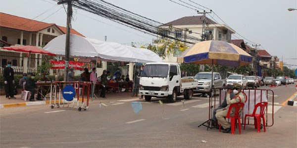 Người nước ngoài nhập cảnh Lào sau ngày 3.5 tự trả chi phí cách ly - Anh 1