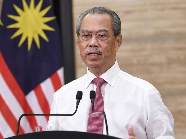 Malaysia chuẩn bị nới lỏng các biện pháp giãn cách xã hội - Anh 1