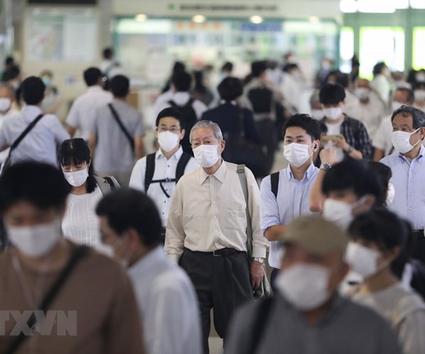 Thủ đô Tokyo cảnh báo cao nhất về nguy cơ lây lan dịch Covid-19 - Anh 1