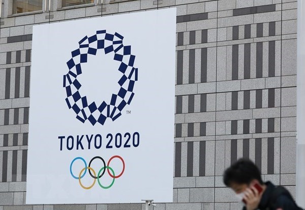 Nhật Bản họp bàn về phòng dịch Covid-19 cho Olympic Tokyo - Anh 1