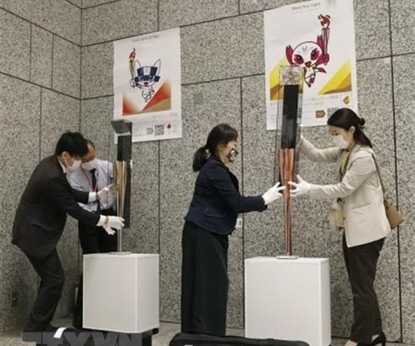 Nhật Bản kỳ vọng Olympic 2020 trở thành hình mẫu mới hậu Covid-19 - Anh 1