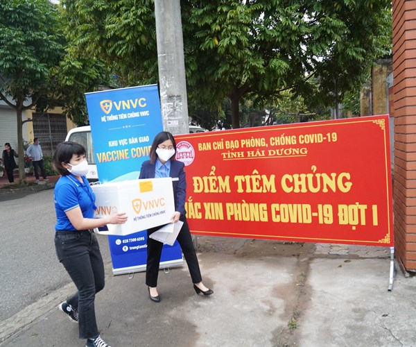 Việt Nam bắt đầu tiêm chủng vaccine phòng, ngừa Covid-19 - Anh 7