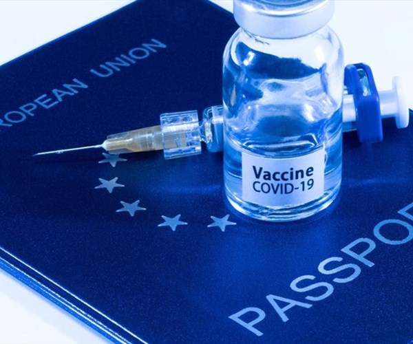 Ý tưởng hộ chiếu vaccine: Cuộc tranh luận chưa có hồi kết - Anh 1