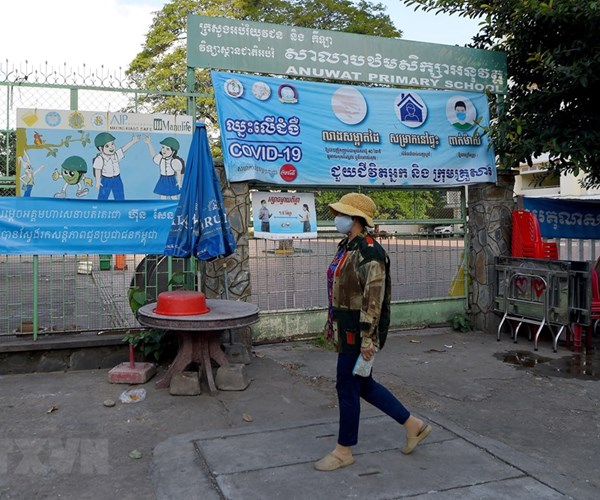 Campuchia: Nhiều tỉnh, thành ban bố biện pháp phòng dịch nghiêm ngặt - Anh 1