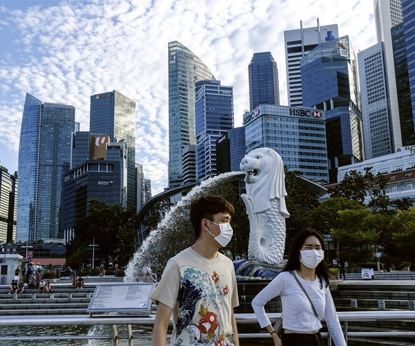Singapore nâng thời gian cách ly bắt buộc với du khách - Anh 1