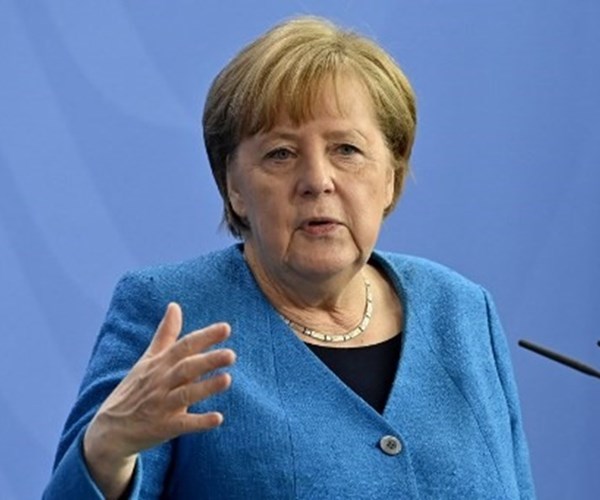 Thủ tướng Đức lạc quan vào du lịch Châu Âu mùa hè tới - Anh 1