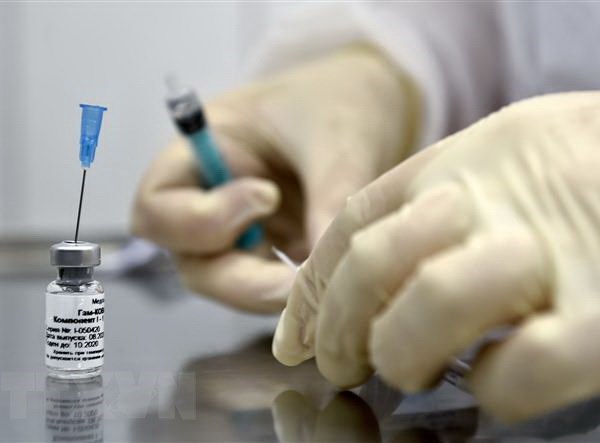 Nga có thể sản xuất 30 triệu liều vaccine ngừa Covid-19 mỗi tháng - Anh 1