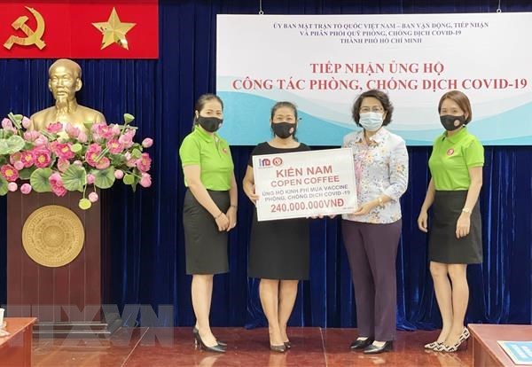 TP. Hồ Chí Minh: 2.197 tỷ đồng được các cam kết ủng hộ để mua vaccine - Anh 1