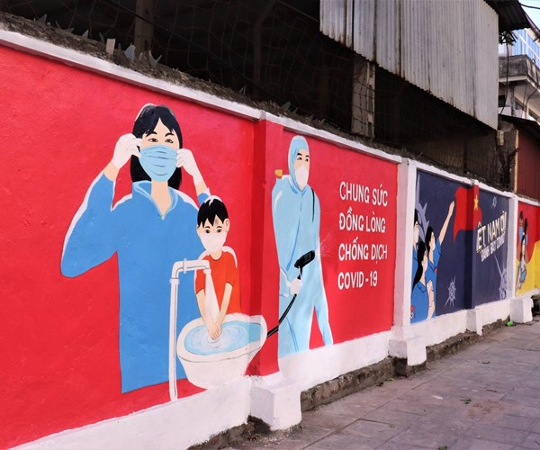 Độc đáo con đường bích họa tuyên truyền phòng, chống dịch Covid-19 ở Hà Nội - Anh 4