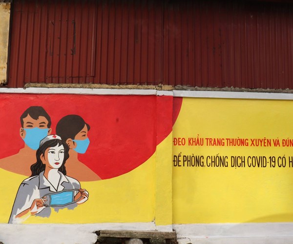 Độc đáo con đường bích họa tuyên truyền phòng, chống dịch Covid-19 ở Hà Nội - Anh 8