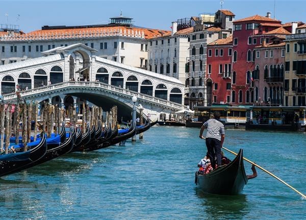 Thành phố Venice thoát khỏi việc bị xếp loại di sản thế giới bị đe dọa - Anh 1