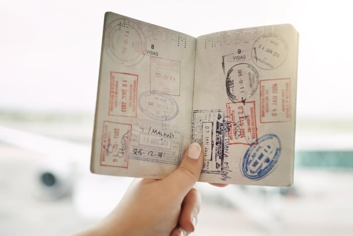 Singapore dừng đóng dấu vào hộ chiếu du khách nhập cảnh ngắn hạn - Anh 1