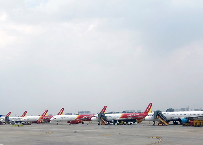 Sân bay Tân Sơn Nhất dự kiến đón hơn 4.400 chuyến bay trong dịp lễ 30.4 và 1.5 - Anh 1