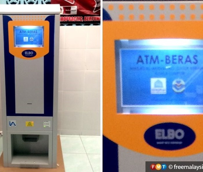 Malaysia: Độc đáo máy ATM nhận tiền nhưng chỉ xuất gạo - Anh 1