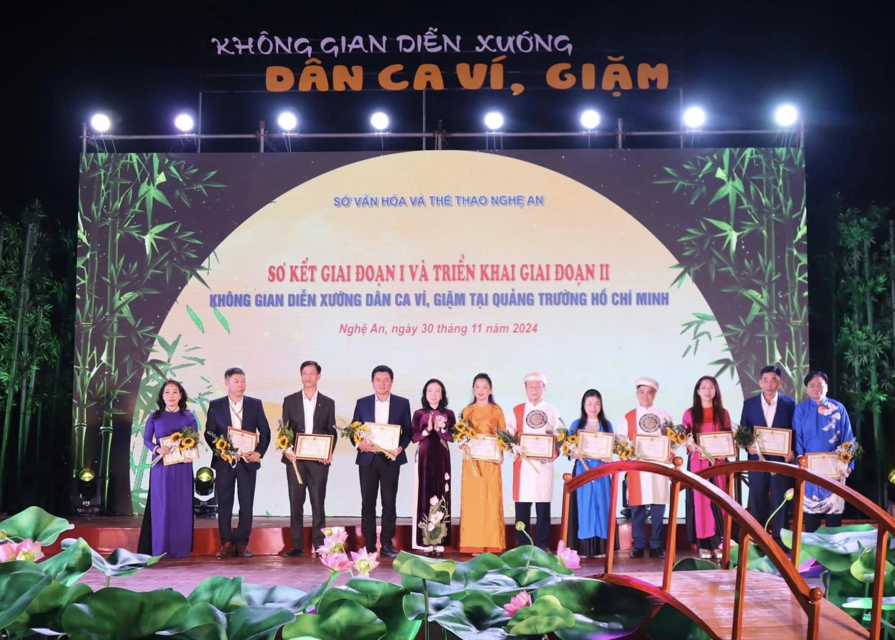 Reenacting the Vi and Giam folk song performance space at Ho Chi Minh Square - photo 2