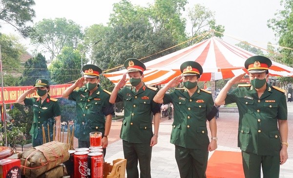 Truy điệu và an táng 95 hài cốt liệt sĩ quân tình nguyện và chuyên gia Việt Nam hy sinh tại Lào - ảnh 2