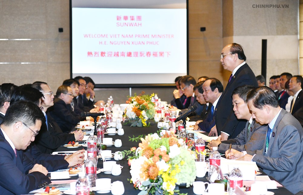 Thủ tướng đề nghị các doanh nghiệp Trung Quốc hợp tác nhập khẩu các sản phẩm nông nghiệp của Việt Nam - ảnh 1