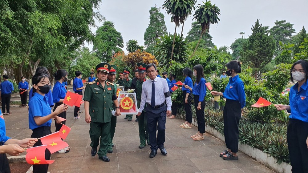 Lễ truy điệu và an táng 21 hài cốt liệt sĩ Việt Nam hi sinh tại Campuchia  - ảnh 1