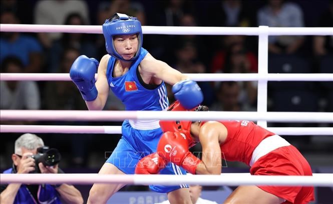 Võ sĩ Hà Thị Linh thắng áp đảo trong trận đầu ra quân Olympic Paris 2024 - ảnh 1